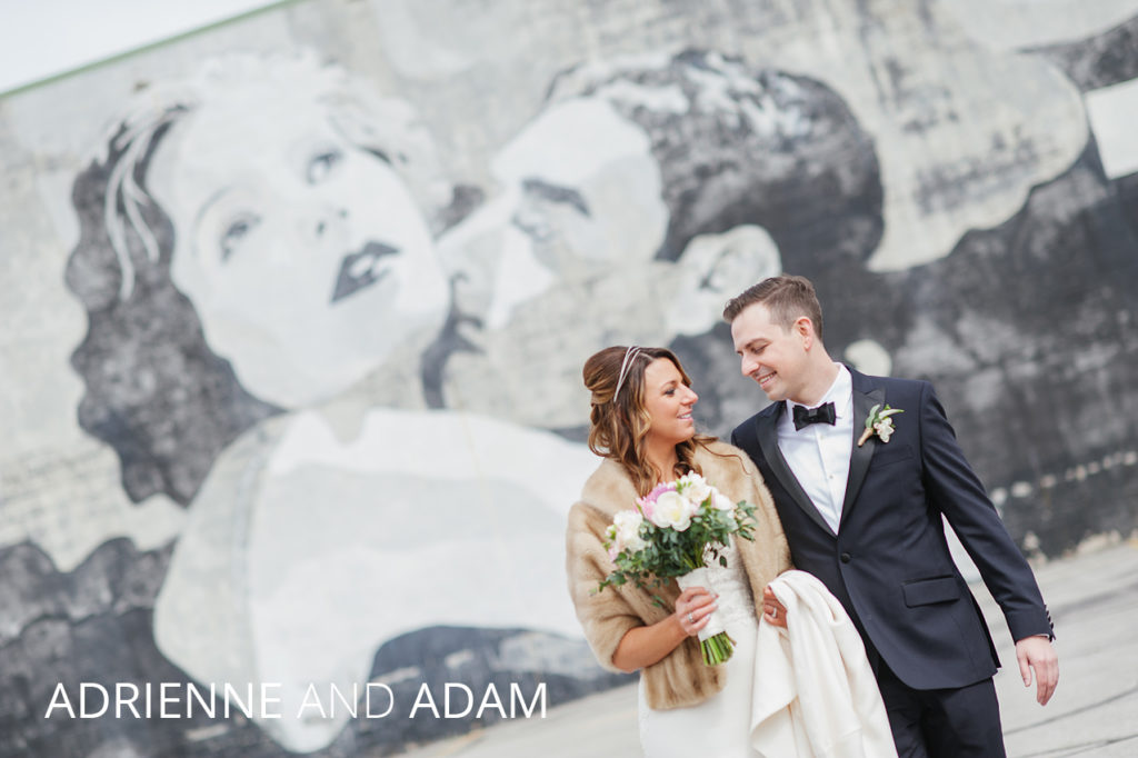 aaw | Jessica Miller Photography couple walking infront of columbus mural