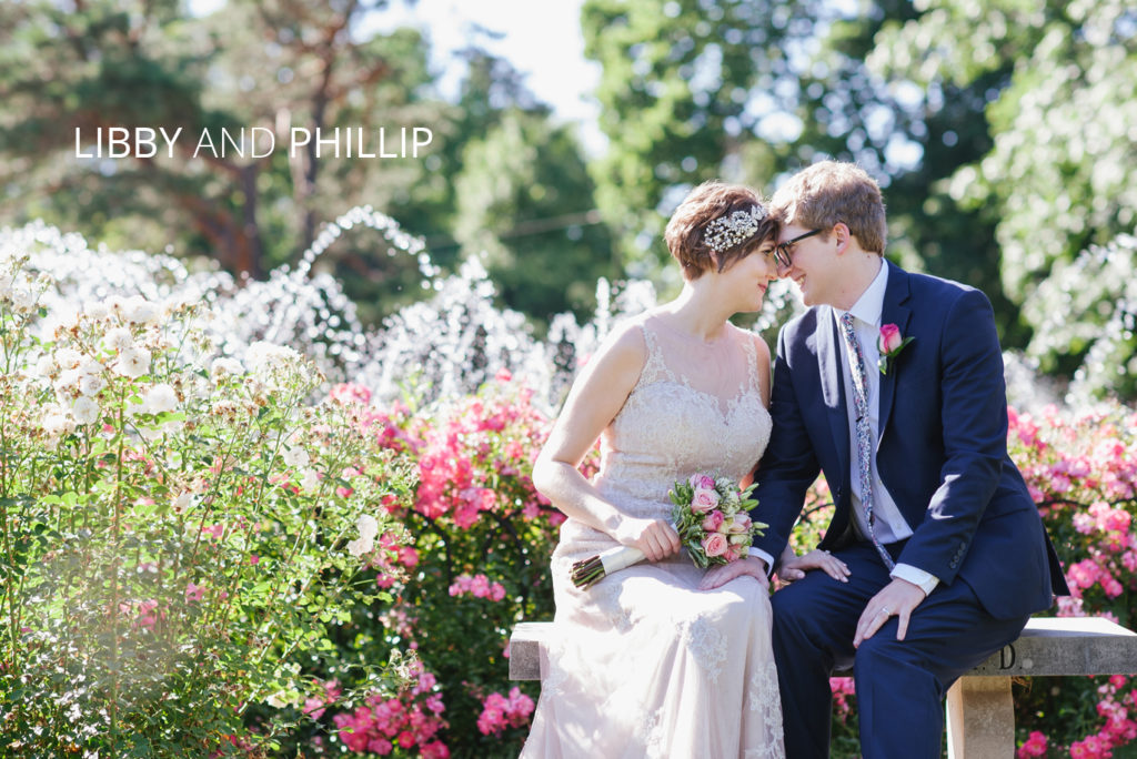 libby-phillip | Jessica Miller Photography bride and groom in front of fountain surrounded by roses