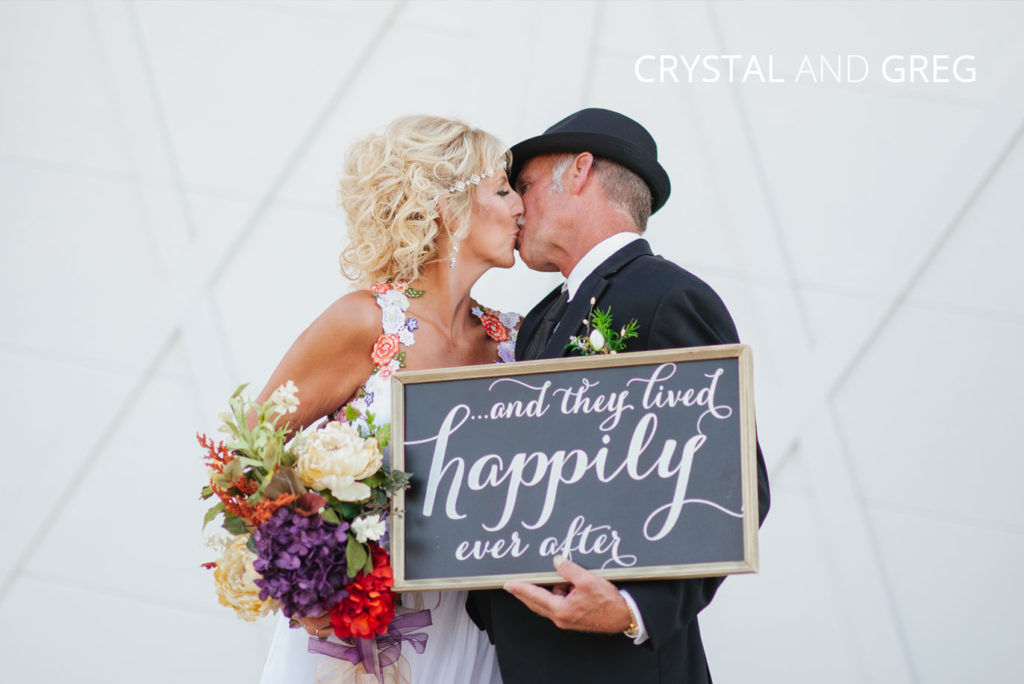 crystal-and-greg | Jessica Miller Photography cute couple kissing holding a sign