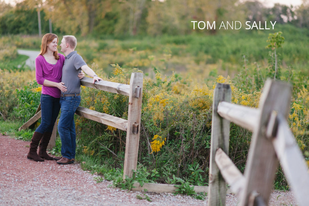 tom-and-sally | Jessica Miller Photography happy couple leaning on fence