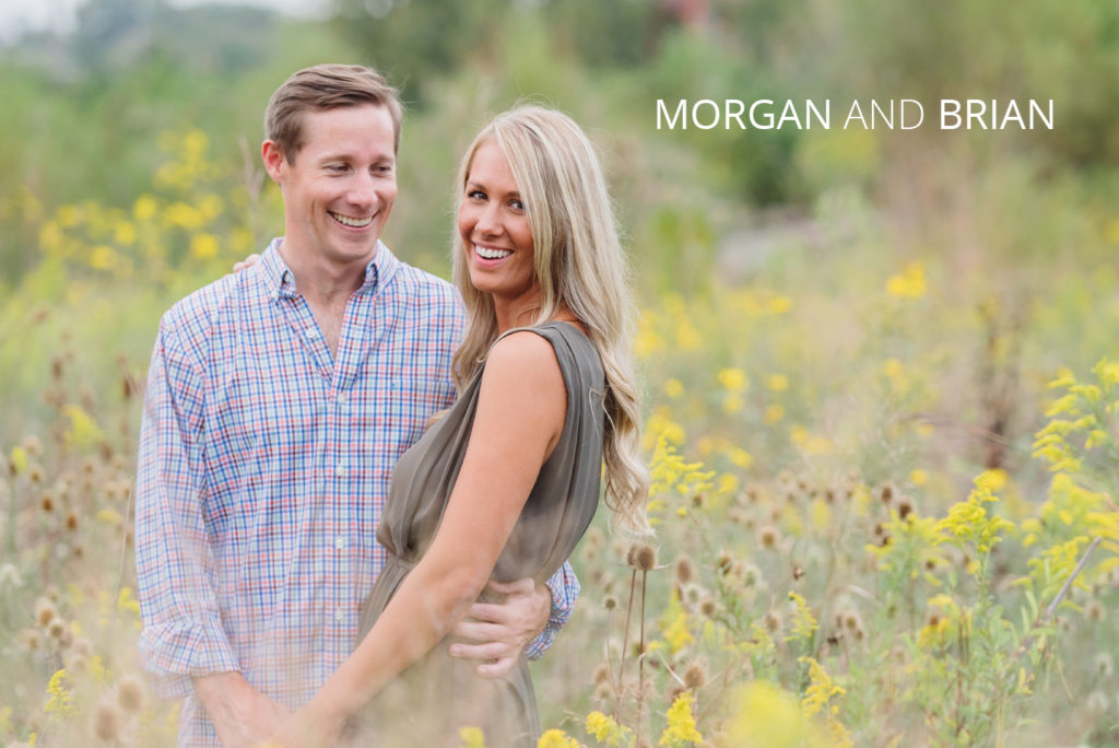 Morgan and Brian | Jessica Miller Photography happy engaged couple standing in a wild flower field