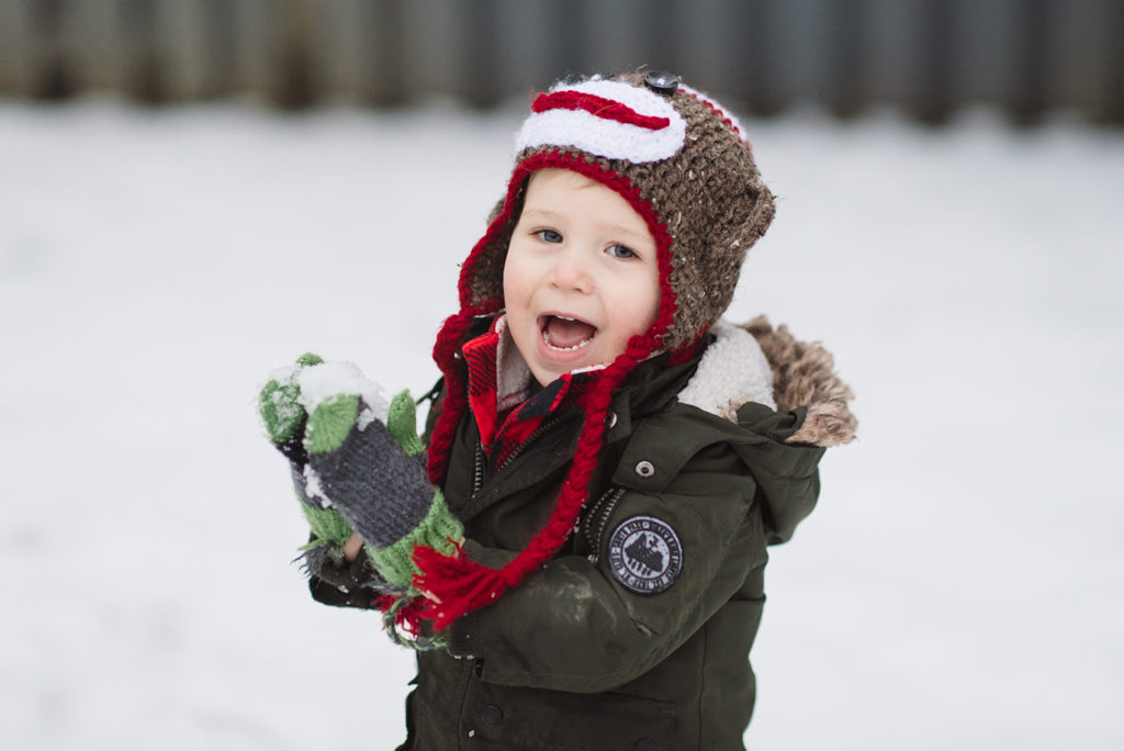 Caddie | Jessica Miller Photography SMiling little boy playing in the snow