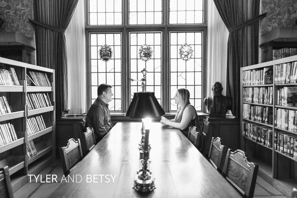 Tyler and Betsy | Jessica Miller Photography tyler and betsy looking at eachother in a library