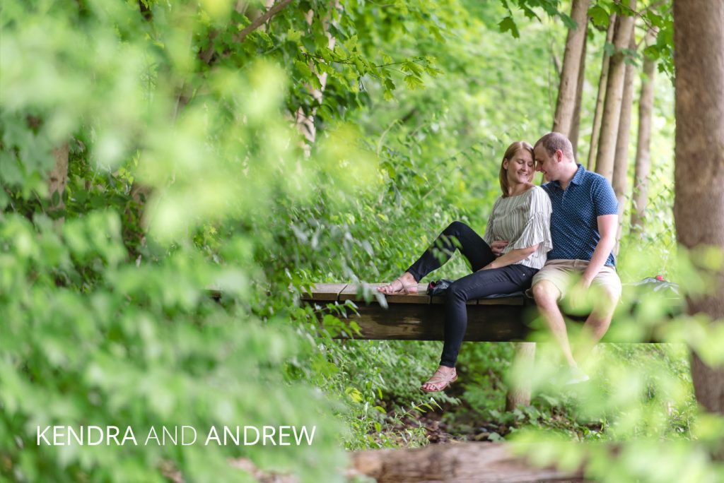 cover | Jessica Miller Photography kendra and andrew sitting on a bridge