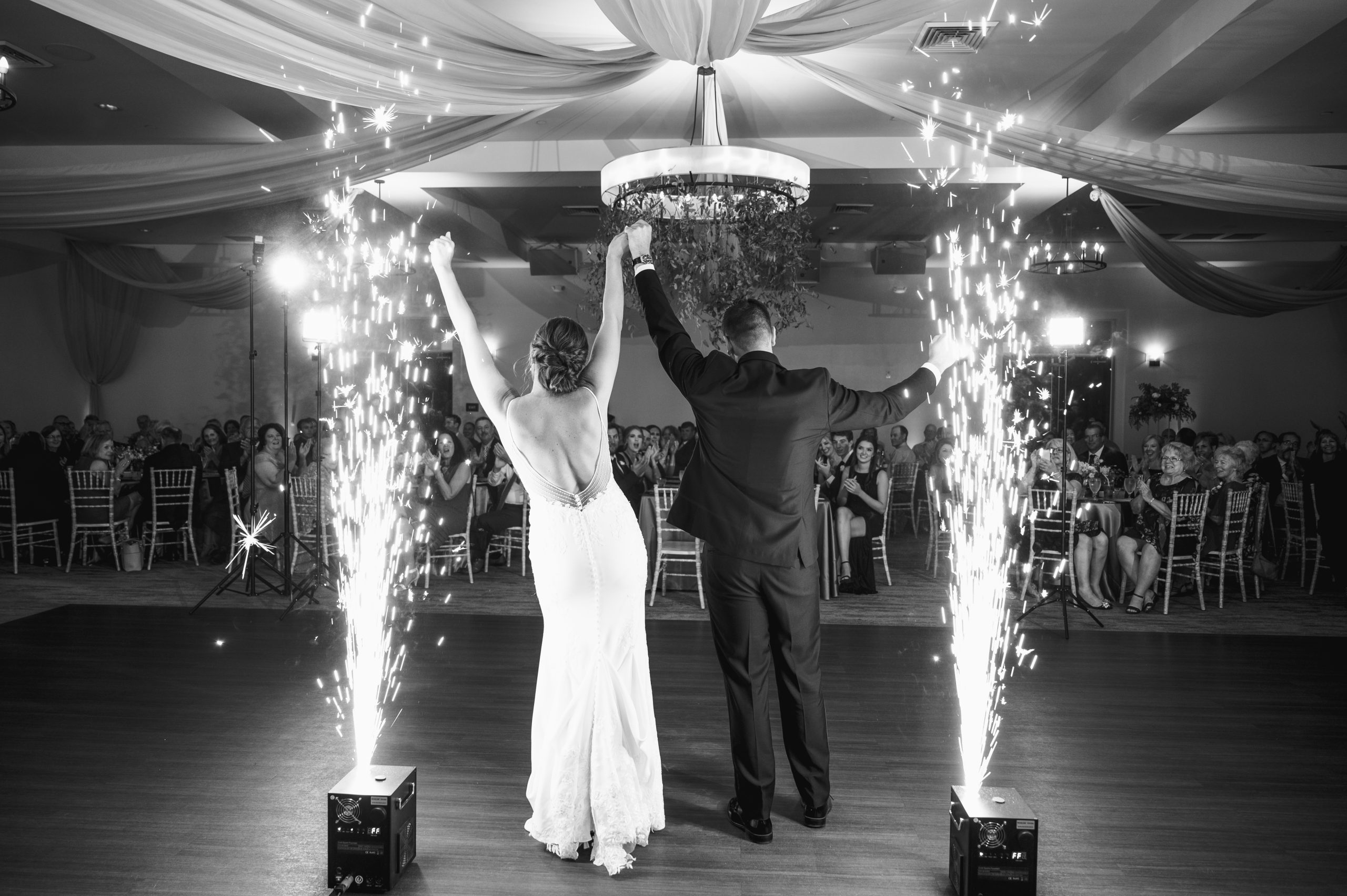 bride and groom have cold sparks at wedding